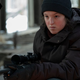 ellie with a gun.
